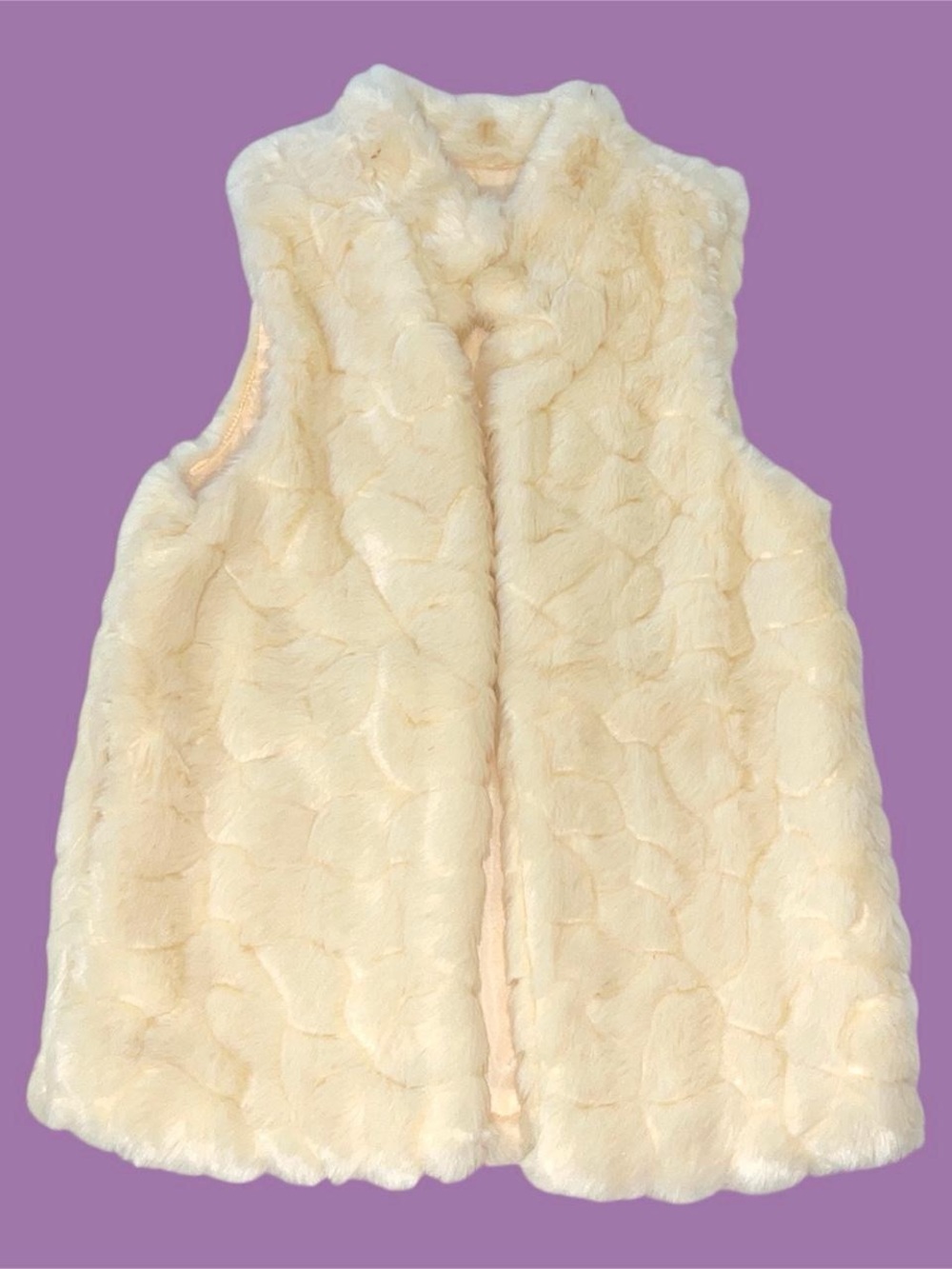 love tree cream faux fur vest.